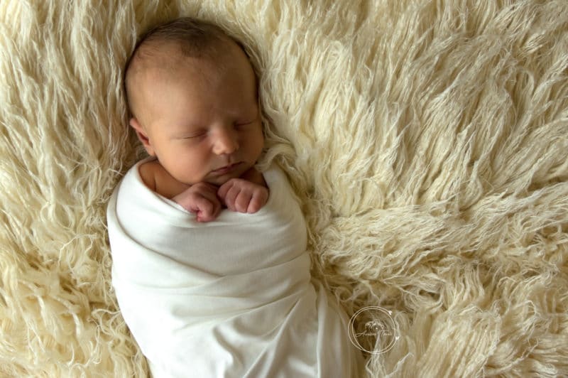 Photo d'un bébé en séance photo