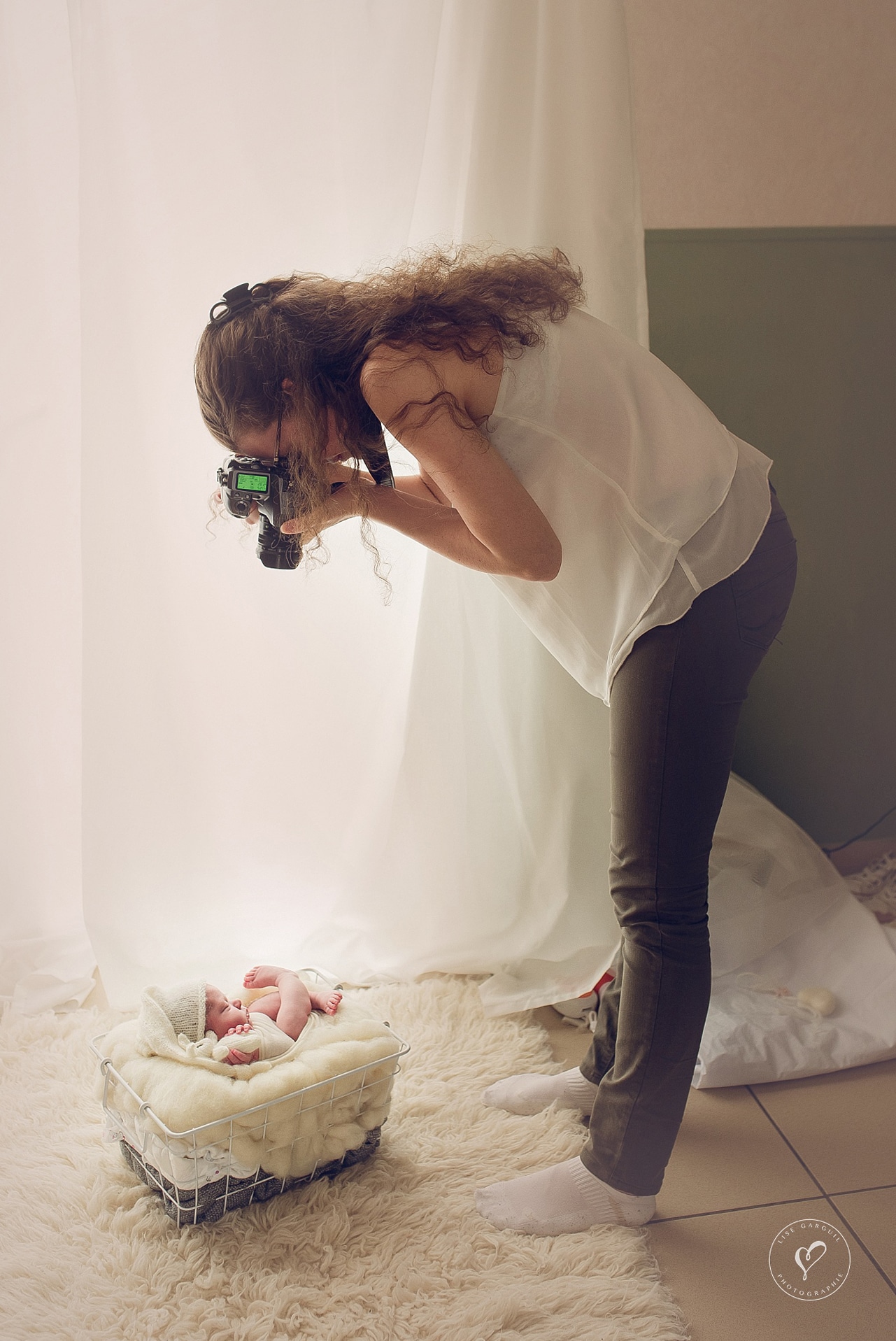 Photographe pendant une séance photo